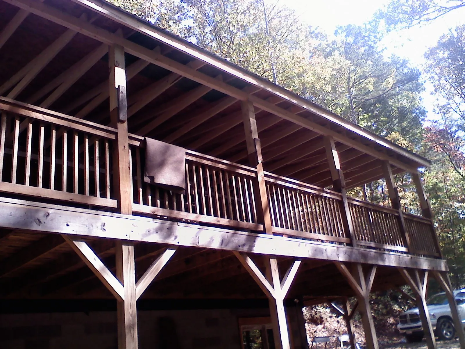 Timber framing under a new elevated porch and deck — Roof Leak Repair in Rosemount by Roofing Brothers